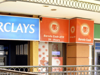 Bank signposts at Oasis Mall, Kampala