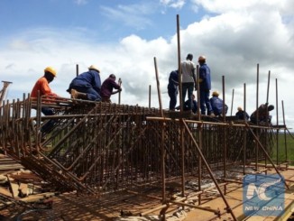 Construction workers at a construction site