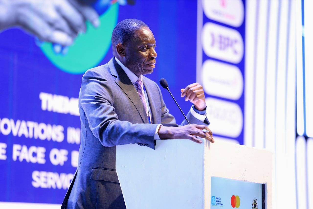 Michael Atingi-Ego, the deputy governor of the Bank of Uganda giving a speech